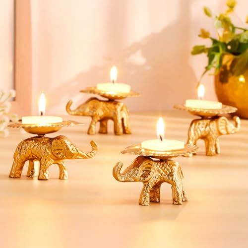 Image of Amazon Brand - Solimo Decorative Handcrafted Metal Elephant Diya for Puja | Tealight Candle Holder for Home Decor & Gifting (Pack of 4) | 8 x 6.5 x 4.5 cm Each | Gold Finish