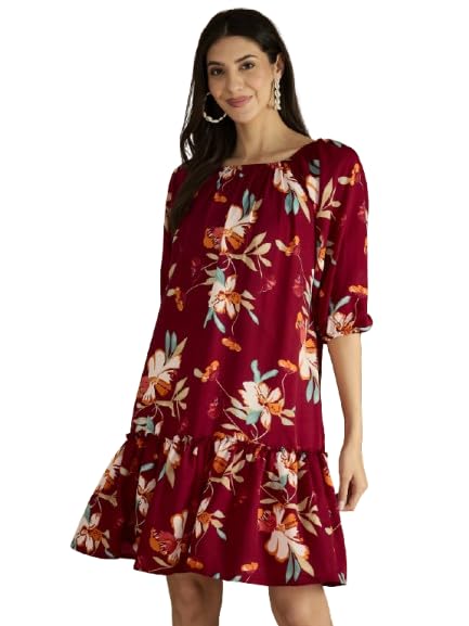 Robe longueur genou imprimée Varanga à col élastique et manches ballon amples