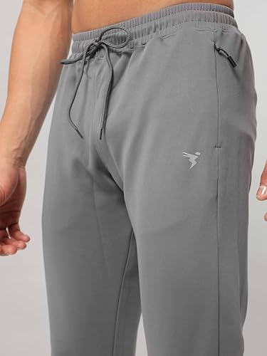 Image of TECHNOSPORT Men's Slim Fit Track Pants with Zip Pockets, ELASTO Plus Quick Dry Stretchable Lightweight Lower for Gym Running Yoga and Sports