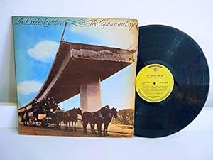 The Dooobie Brothers - The Captain And Me por The Doobie Brothers — capa do álbum