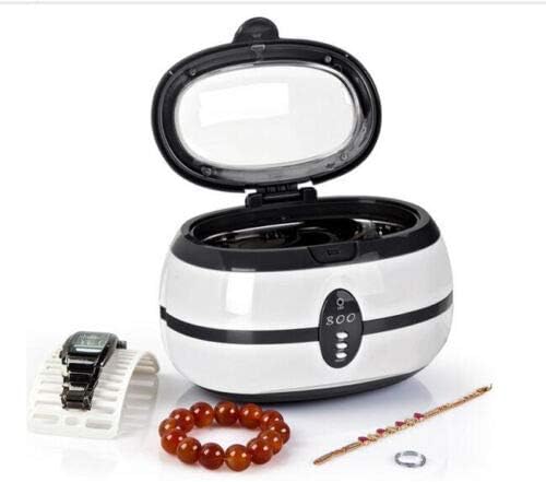 Cleaned jewelry and watch next to OUBO VGT-800 Ultrasonic Cleaner