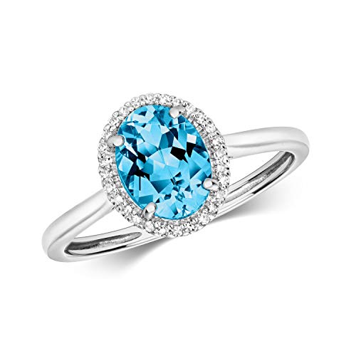 Bague or blanc 9 carats diamant et topaze bleu : le cadeau idéal pour femme