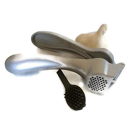 Pampered Chef Garlic Press 2575 - Easy Squeeze, Rust Proof, Ergonomic Handle - Professional Garlic Mincer & Ginger Press with Handy Cleaning Brush