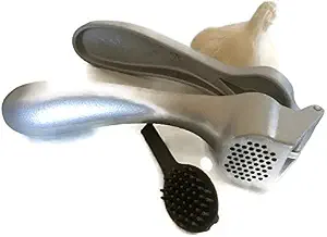 Pampered Chef Garlic Press 2575 - Easy Squeeze, Rust Proof, Ergonomic Handle - Professional Garlic Mincer & Ginger Press with Handy Cleaning Brush