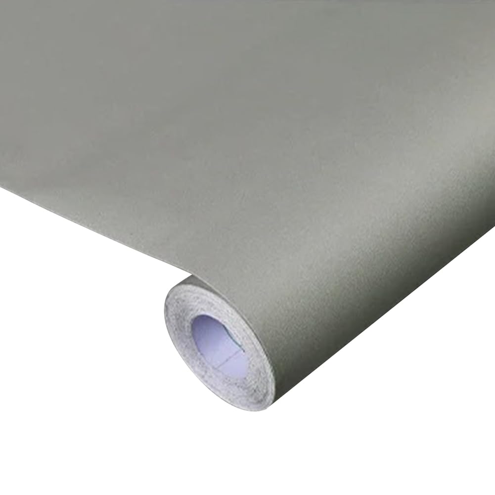 Papier peint autocollant gris ciment pour masquer un mur abîmé