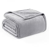Design élégant: Dotée d'une finition pelucheuse double face, elle assure un toucher doux et soyeux, avec un design riche et accueillant qui ajoute une touche élégante