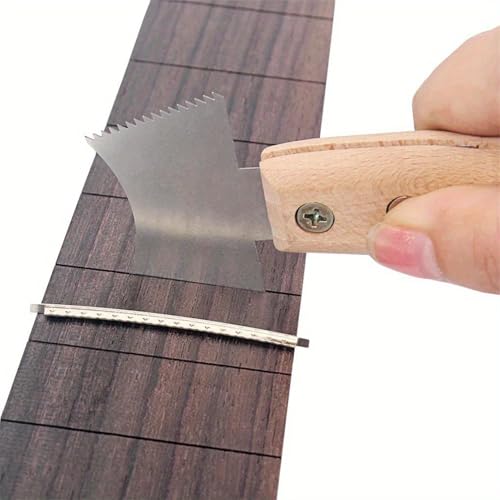 Nettoyer les touches grâce à la règle de guitare droite entaillée