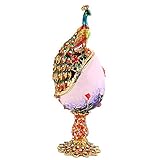 pavo real colorido de diamantes de imitación, de pie sobre el huevo de Pascua de esmalte