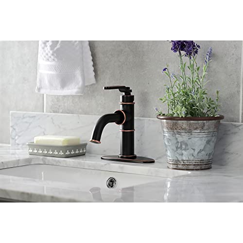 Mitigeur de lavabo monotrou avec bonde push pop-up et finition bronze