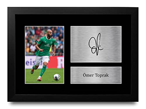 ✯ UN REGALO CHE Adoreranno - Segna un vincitore di livello mondiale con questa foto stampata firmata di una delle leggende del calcio più famose al mondo, Omer Toprak. Il primo regalo per loro e i migliori punti per regalare a te – dietro la rete!