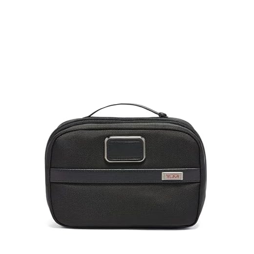 TUMI - Alpha 3 Split Travel Kit - Luggage Accessories Toiletry Bag for Men and Women with Embossed Leather Carry Handle - Black