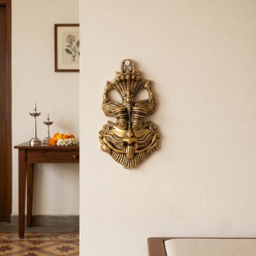 Image of Kridaykraft Metal Feng Shui Vastu Showpiece Nazar Battu with Naag Ganesha Suraksha Kawach Mask for Evil Eye Protection for Home, Office Wall & Door Hanging (Gold, Medium) - 9.5 Cm