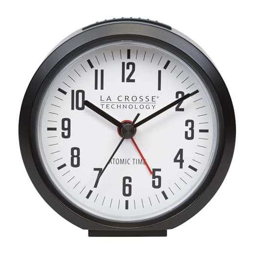 La Crosse Technology 617 710 B INT 4 Inch Round Black Atomic Analog Alarm Clock product image
