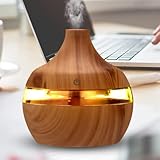 [300ML AROMA DIFFUSER WITH HUMIDIFIER FUNCTION] Enjoy the benefits of aromatherapy with this 300ml diffuser that continuously releases calming scents to enhance relaxation in your home. [7 COLOR LED LIGHTS FOR AMBIENCE] Choose from seven LED color se...