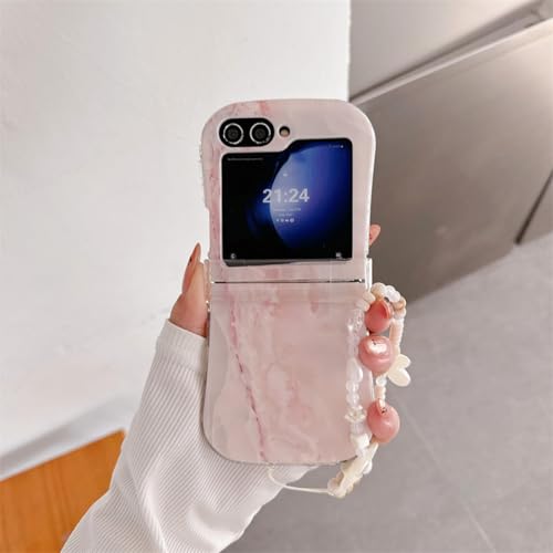 Coque Samsung Z Flip 6 évite les chutes grâce au bracelet marbré rose