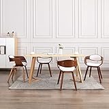 Polyvalentes et élégantes : ces chaises de salle à manger rembourrées avec leur look simple et moderne s'intègrent parfaitement dans différents styles de décoration et constituent un ajout élégant à n'importe quelle maison.