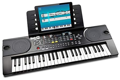 Piano RockJam con teclado de 49 teclas con fuente de alimentación, atril para partituras, pegatinas para notas de piano y lecciones de piano simple. | Ya disponible en tu tienda friki favorita! En mundofriki.es!