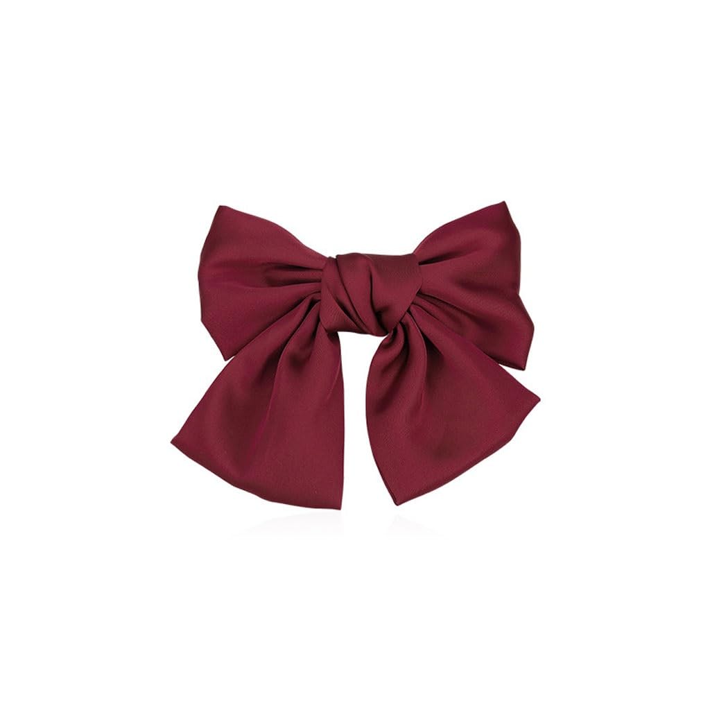 Pince à cheveux noire barrette noeud rouge et accessoire réveillon femme