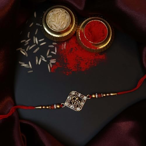 Image of Oblivion Ganpati Design Rakhi Set of 2 for Brother with Silver Colour Pooja Coin, Tilak Set and Greeting Card for Raksha Bandhan Celebration