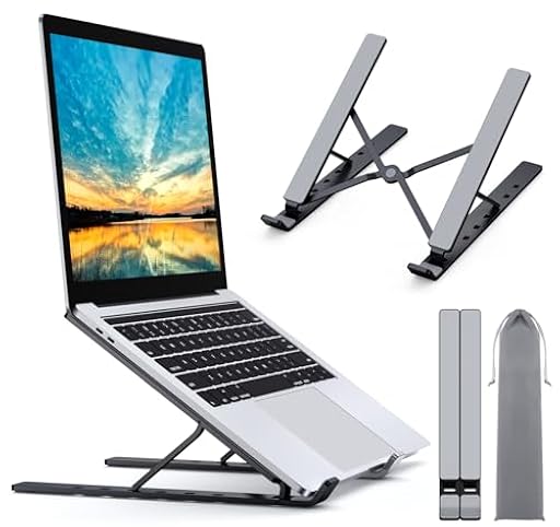 Babacom Soporte Portatil Mesa 5 Ángulos Adjustable, Aleación de Aluminio, Refrigeración Soporte Ordenador Portátil, Plegable Soporte para Portatil, para Macbook, PC y Otro 10-15.6” Portatiles | Ya disponible en tu tienda friki favorita! En mundofriki.es!