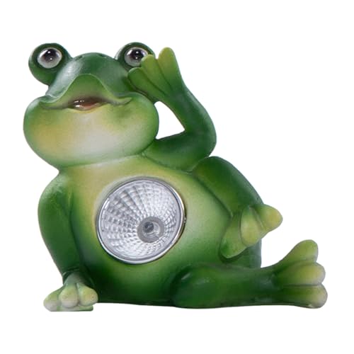 Lampe solaire grenouille illuminant une table de fête en extérieur