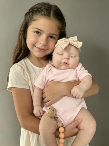 Muñeca bebé reborn silicone 22" 10 lbs DangTpor miniatura 3