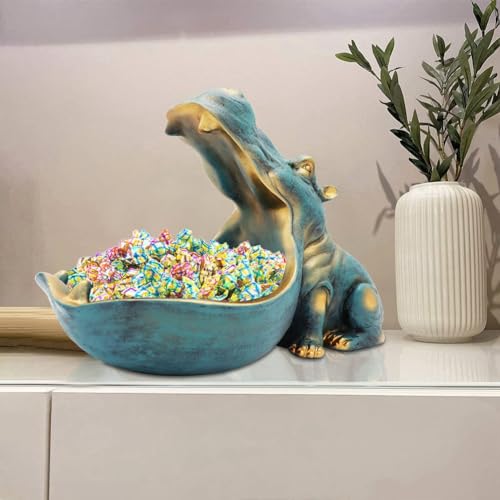 Statue hippopotame en résine dorée pour décorer une table d'entrée chic