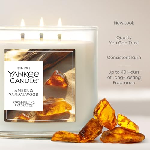 Image of Yankee Candle Amber & Sandalwood, Fall Scented Candle, 14.5oz 3-Wick Candle Jar with up to 40 Hours Burn Time