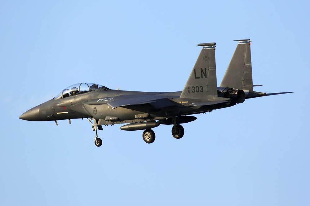 F-15E jet fighter of of the U.S. Air Force landing. Poster Print by Artem Alexandrovich/Stocktrek Images (17 x 11)