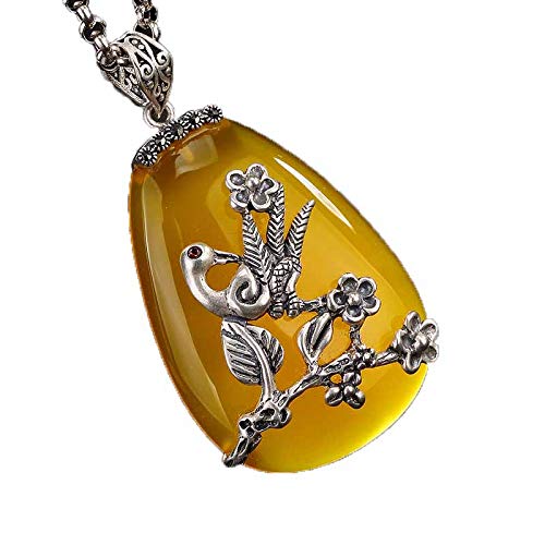 Pendentif en argent 925 et calcédoine jaune fait pour sublimer vos pulls d'hiver