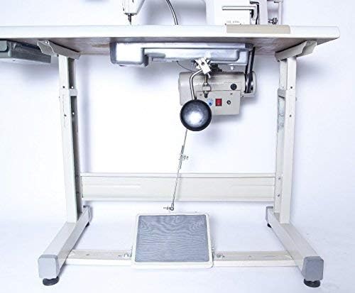 Assembled industrial sewing machine with table and foot pedal