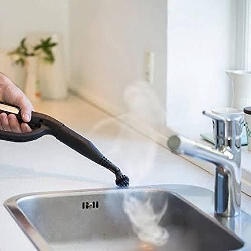 Steam cleaner detail nozzle cleaning a kitchen sink