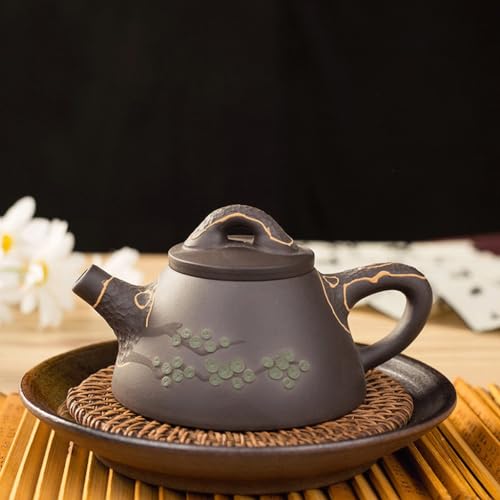 Kettle pot traditionnel en céramique d'art avec infuseur de thé