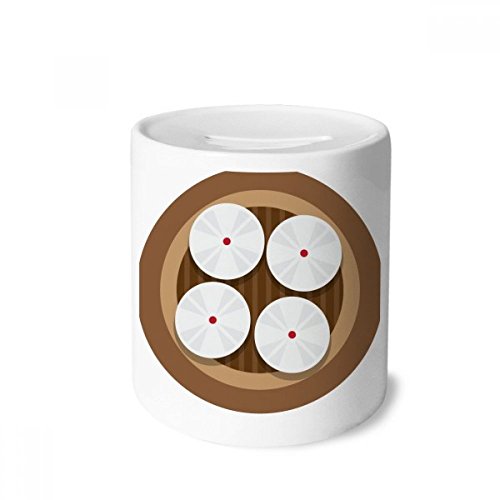 Tirelire en céramique steamed buns sur un bureau pour décorer et épargner au quotidien