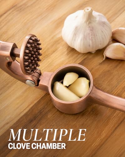 Image of Zulay Kitchen Premium Garlic Press Set - Rust Proof Professional Garlic Mincer Tool - Easy-Squeeze, Easy-Clean with Soft, Ergonomic Handle - Silicone Garlic Peeler & Brush (Copper)
