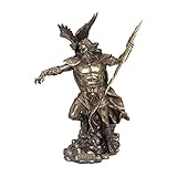 Esta figura decorativa en color bronce tiene unas dimensiones de 50 x 15 x 30 cm
