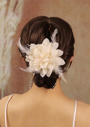 Pince à cheveux fleur et grand nœud en tulle pour sublimer la mariée