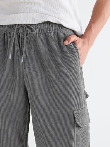 Image of Bewakoof Men's Oversized Fit Mid Rise Cotton Cargo Pant| Loose Fit Street-Style Comfort | Utility Pockets | Everyday Wear
