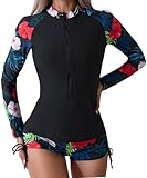 Design Élégant et Fonctionnel : Doté d'un imprimé floral tendance, ce rash guard allie style et praticité. Les manches longues offrent une protection et une couverture supplémentaires, tandis que le shorty coupe garçonne affine la silhouette tout en garantissant confort et modestie.