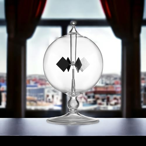 clear solar power crookes radiometer sun light energy spinning vanes