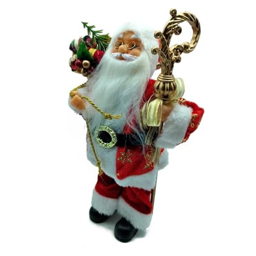AC - Figura de Papa Noel con Bolsa de Regalo y bastón Dorado - Fabricado en Poliéster y Plástico - Artículo Decorativo para Navidad - 30 x 19 x 11 cm
