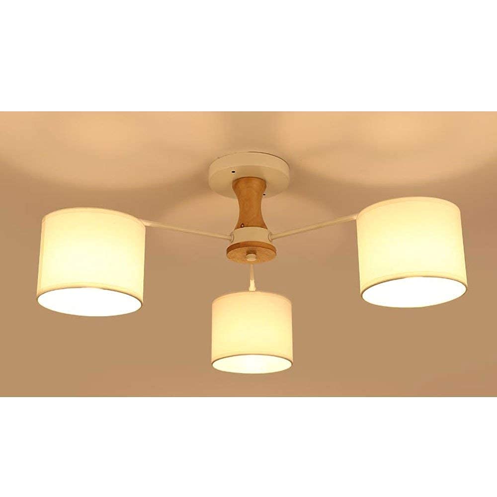 Lustre en bois de salon pour remplacer un plafonnier trop terne