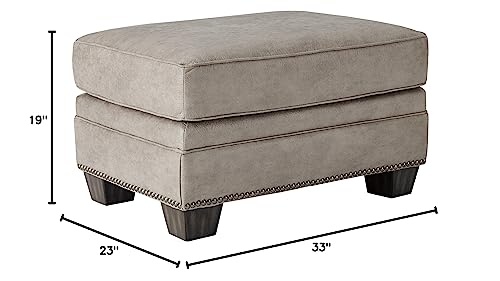 Signature Design By Ashley Olsberg Faux Leather Ottoman With Nailhead Trim, Gray #TOP2