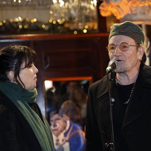Watch Bono and Imelda May sing &lsquo;Christmas (Baby Please Come Home)&rsquo; at annual Dublin busking gig
