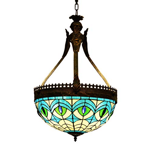 Lustre Tiffany bleu paon fini la lumière agressive avec ce plafonnier rétro