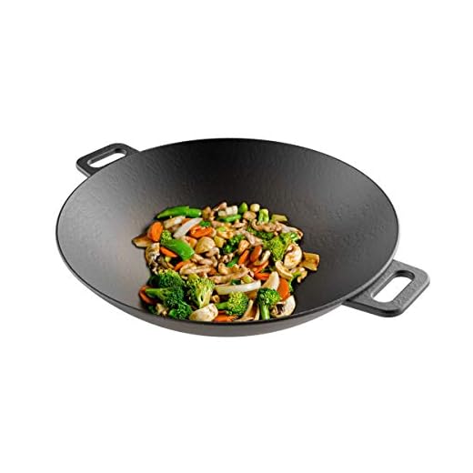 12 Best Cast Iron Woks You Can Buy On Amazon 11 Cast Iron Wok-14” Pre-Seasoned, Flat Bottom Cookware with Handles-Compatible with Stovetop, Oven, Induction, Grill, or Campfire by Classic Cuisine, (82-KIT1088)
