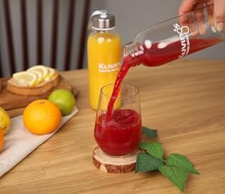 Kuvings | Extracteur de jus AUTO10S + 2 bouteilles en verre | Utilisation "mains libres" | Découpe automatique des fruits et légumes entiers | Panier XXL 3L | Nettoyage facile (Noir)