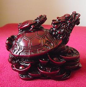 1 X Dragon Headed Turtle in a Dark Red Resin Finish with Baby Turtle on Shell and Standing on a bed of Coins and Gold Ingots; 8c