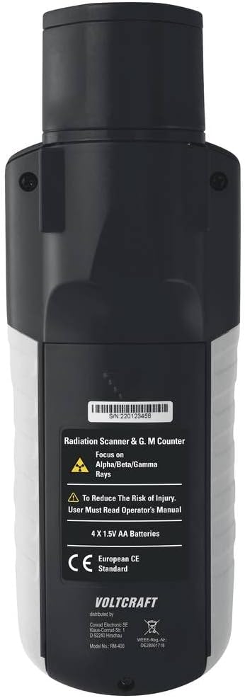 กลับ view of VOLTCRAFT RM-400 Geiger Counter showing battery compartment and warnings