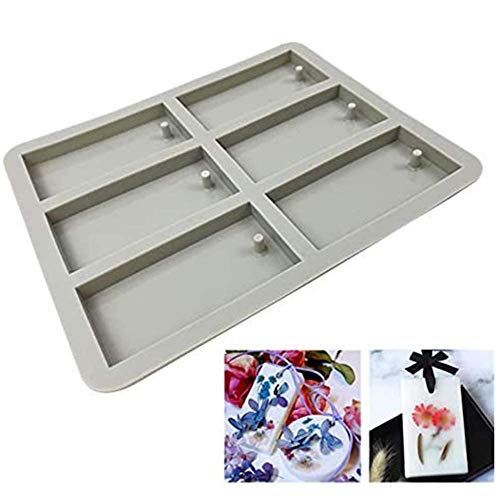 1 moule à cire rectangulaire en silicone pour bijoux en résine avec trou de suspension utilisé pour la fabrication de bijoux artisanaux.